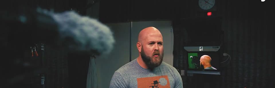 Mitchell Williams on the AJ+ studio set, boom microphone in frame